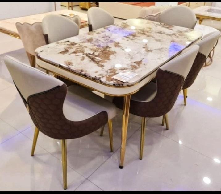 Valencia 6-Seater Marble Dining Table with Gold Legs and Designer Chairs Valencia 6-Seater Marble Dining Table with Gold Legs and Designer Chairs