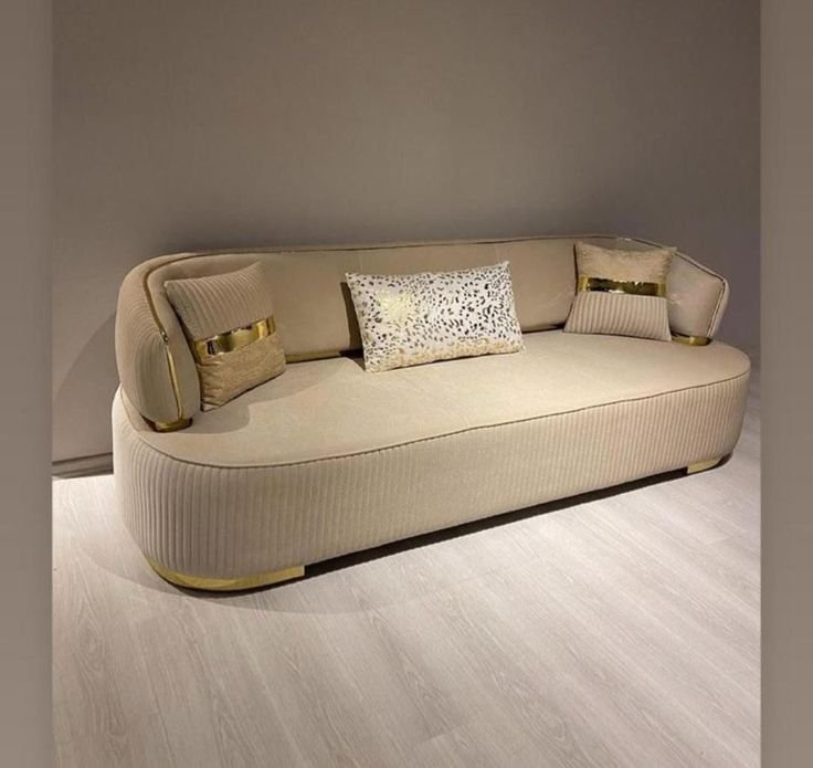 Aurelia Curve Beige Velvet Sofa – Glam Sofa with Gold Accent Details Aurelia Curve Beige Velvet Sofa – Glam Sofa with Gold Accent Details
