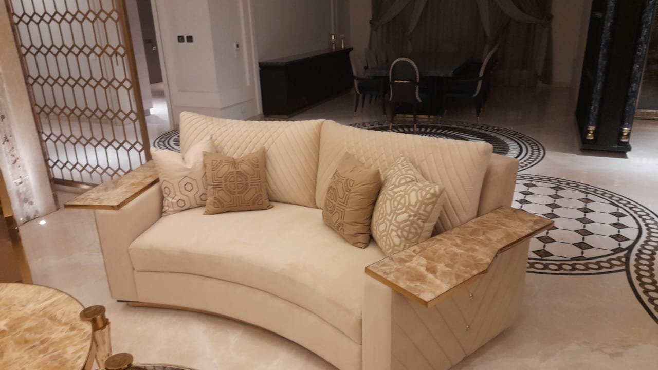 Regalia Cream Curved Sofa with Quilted Back and Marble Arm Panels Regalia Cream Curved Sofa with Quilted Back and Marble Arm Panels